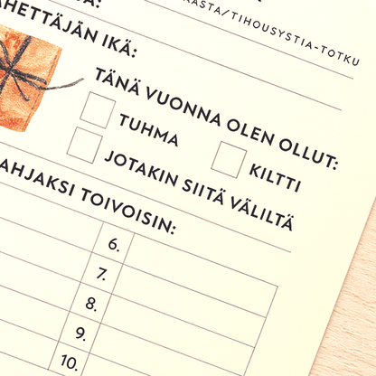 Lapsi täyttämässä Joulupukin lahjatoivelistaa – perheen yhteinen jouluperinne ja muistilista lahjatoiveille.